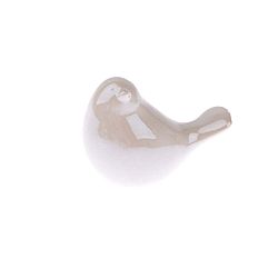 Světle béžová keramická dekorace ve tvaru ptáčka Dakls Easter Deco Birdie Left